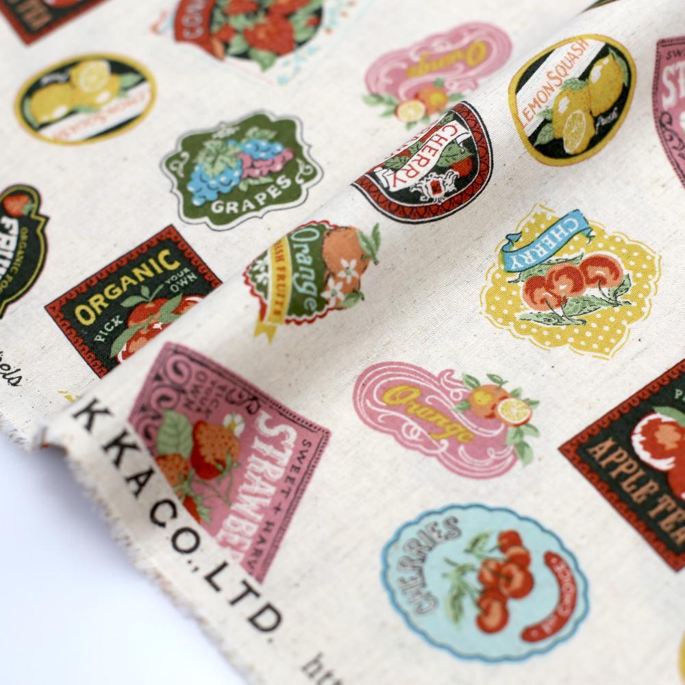 Kokka Vintage Labels Collage Cotton Linen Sheeting - Beige - 50cm